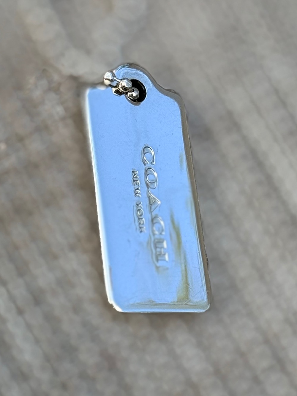 COACH Silver Hang Tag